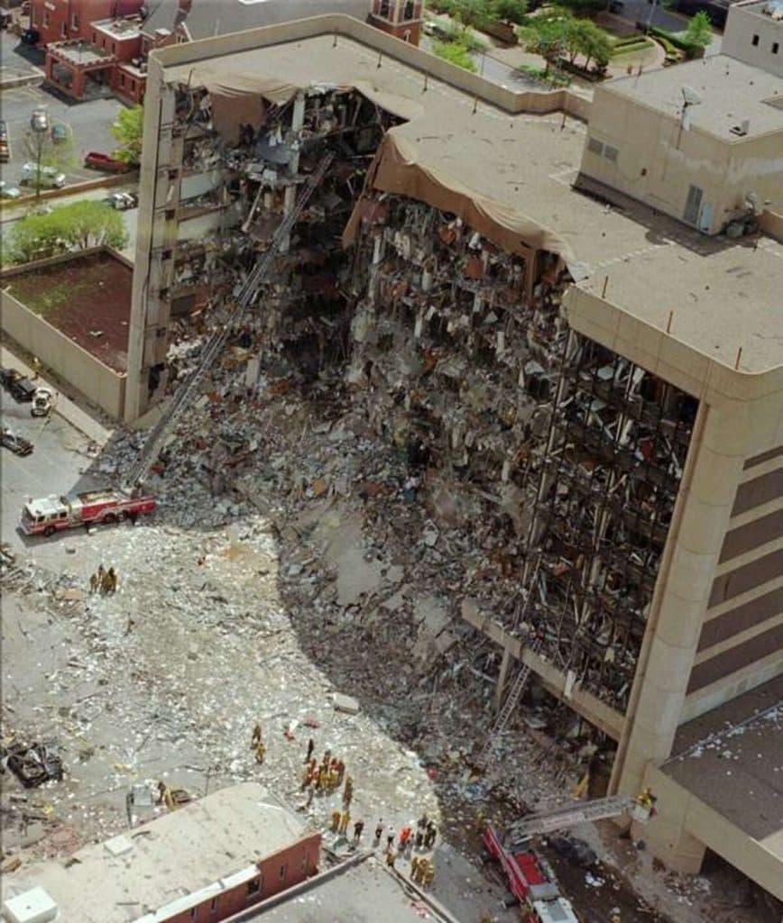 Image of the Alfred P. Murrah Federal Building half ruined and collapsed